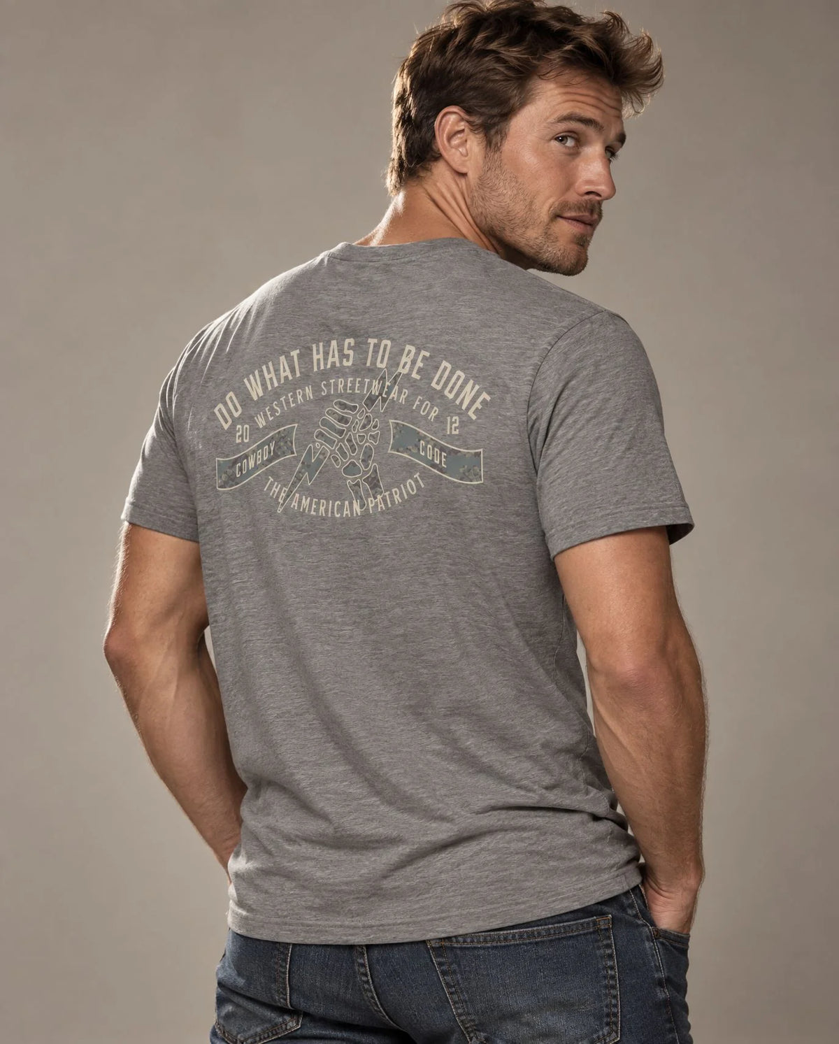 Male model in Cowboy Code No. 4 Do What Has to Be Done tee, Grey, Cowboy Revolution