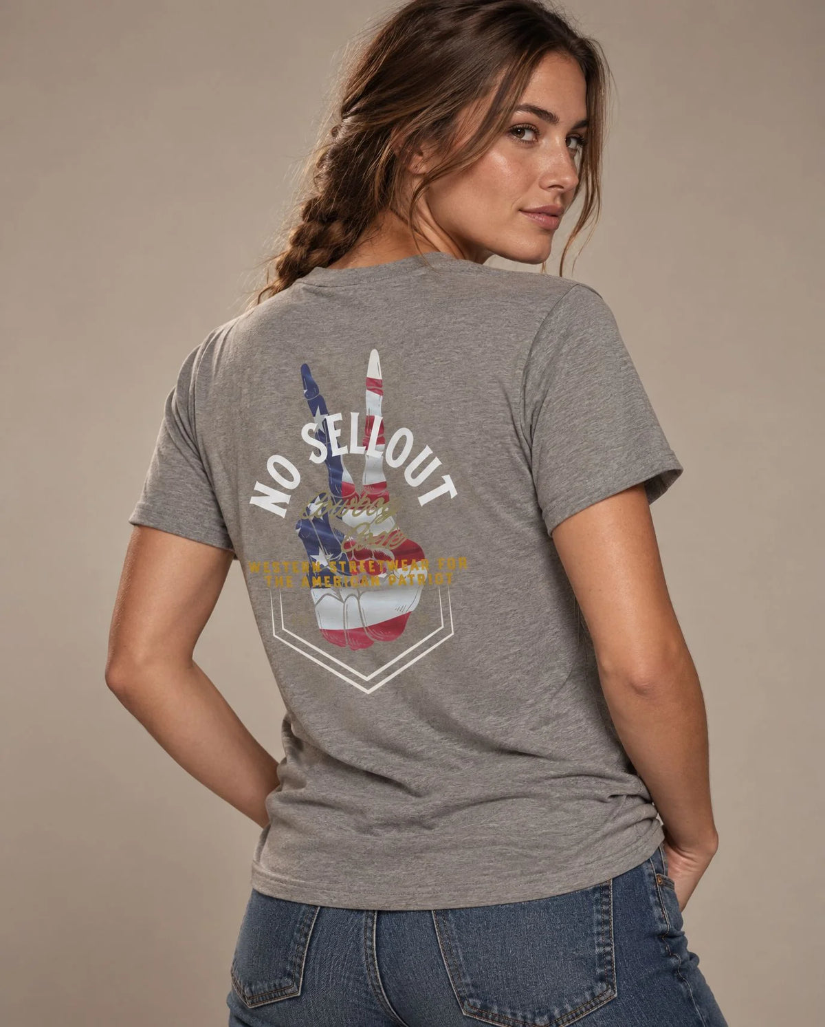 Female model in Cowboy Code No. 9 No Sellout tee, Grey, Cowboy Revolution